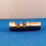 Flat slots and serrations surface broached in pin using a high speed broaching machine.