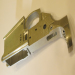 Firearms: Lower receiver for semi-automatic rifle. Broached on a horizontal machine using a 78” pull broach.