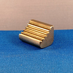 Ratchet pawl surface broached using a high speed broaching machine.
