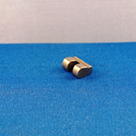 Miniature cam manufatured complete using custom cold rolled material, surface broached and cut off using a series of six broaches in a high speed broaching machine.