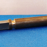 Molding and face tang broached in two passes using a vertical broaching machine.