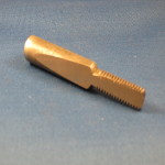 Automotive: Draw bolt for automotive use. External tapered flat is broached using a vertical broaching machine.